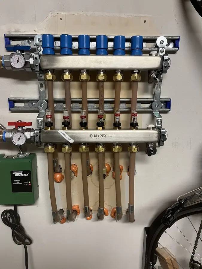 Plumber performing Water Heater Repair at a residential property in Castleton